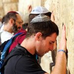 Jewish-men-praying-Western-Wall-Kotel