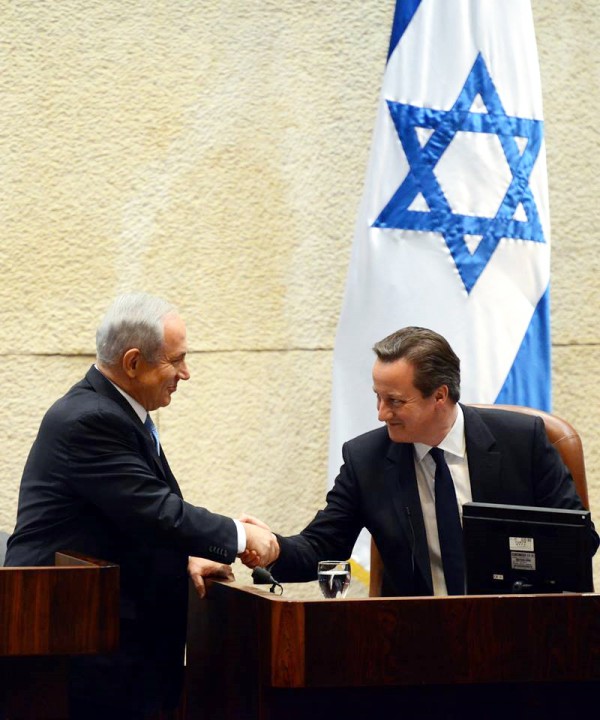 Prime Minister Benjamin Netanyahu welcomes UK Prime Minister David Cameron to the Israeli Parliament.