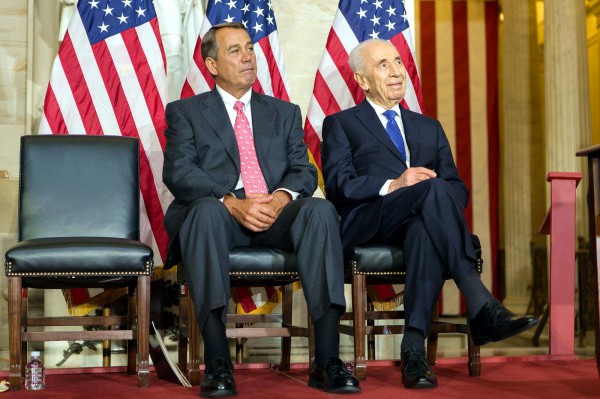 Speaker John Boehner sits beside Israeli President Shimon Peres