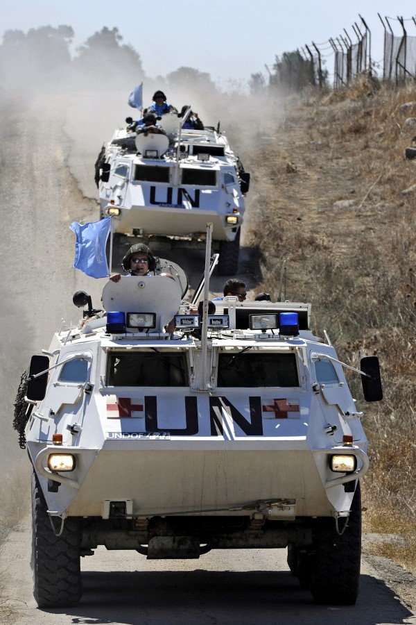 Armored personnel carriers of the UN Disengagement observer Force (UNDOF) on command patrol in the Golan Heights.