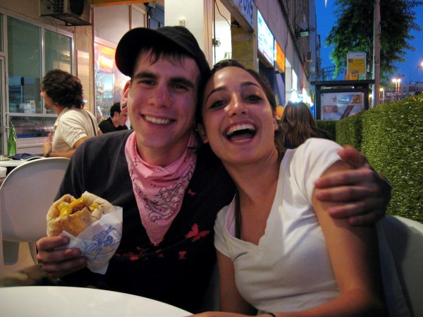 A couple has a bite to eat in Tel Aviv.