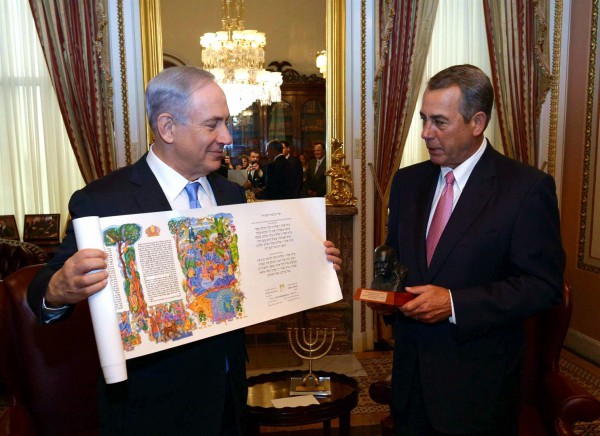 Prime Minister Benjamin Netanyahu presents House Speaker John Boehner with a scroll of the Book of Esther. Boehner presents him with a bust of Winston Churchill because Churchill and Netanyahu are the only foreign leaders who have addressed Congress three separate times. (GPO photo by Amos Ben Gershom)