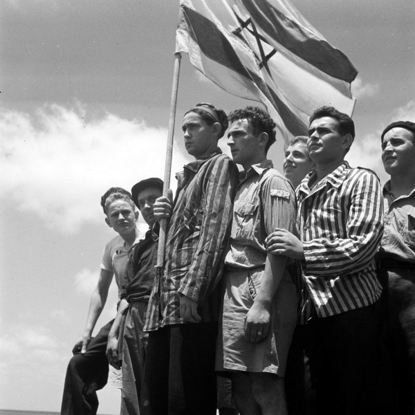 A group of former Buchenwald concentration camp inmates on board the refugee ship Mataroa in Haifa Port (July 7, 1945).  (GPO photo by Kluger Zoltan)