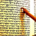 Torah scroll and a wooden yad (Torah pointer)