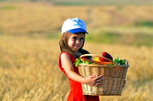 Shavuot-Israeli-child-fruit-vegetables-basket