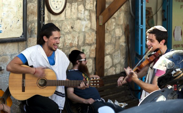 Pre- Shabbat celebration on a street in Tzfat (Safed), a spiritual and artistic center in Israel.