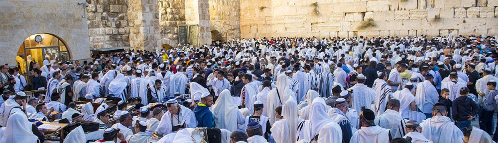 Jewish men gather at the Western (Wailing) Wall for prayer.