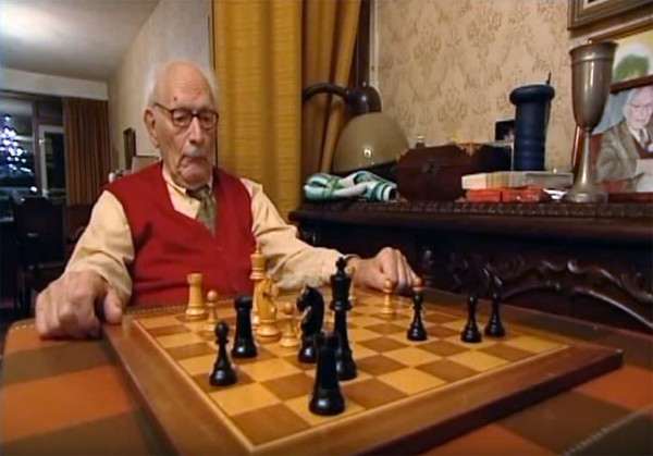 Johan van Hulst was an avid chess player, winning the Corus Chess Tournament for (former) Dutch politicians at the age of 95 and again at 99. (Max Euwe Center Amsterdam YouTube capture)