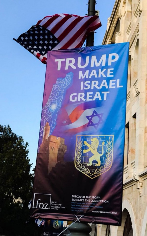 Jerusalem is immersed in posters celebrating the US Embassy move. (Alan Clemmons Twitter capture)