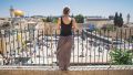 Woman overlooking Western Wall Plaza in Jerusalem